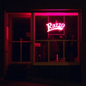 Noir Urban nights shaped by artificial light, color, and quiet tension.